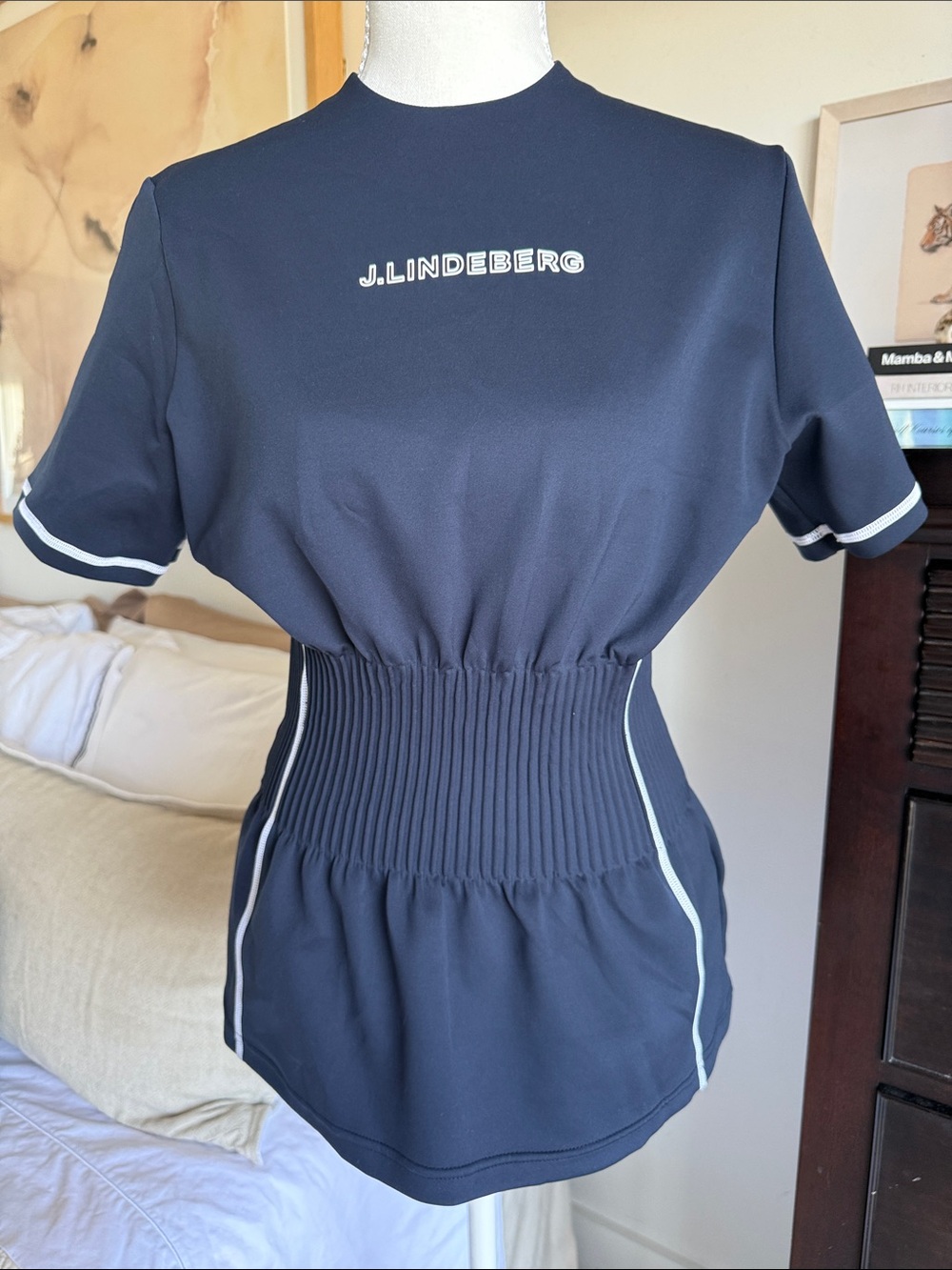J.Lindeberg Navy Short Sleeve Women’s Smocked-Waist Golf Shirt with White Trim